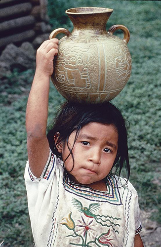 Girl carrying water, Central America